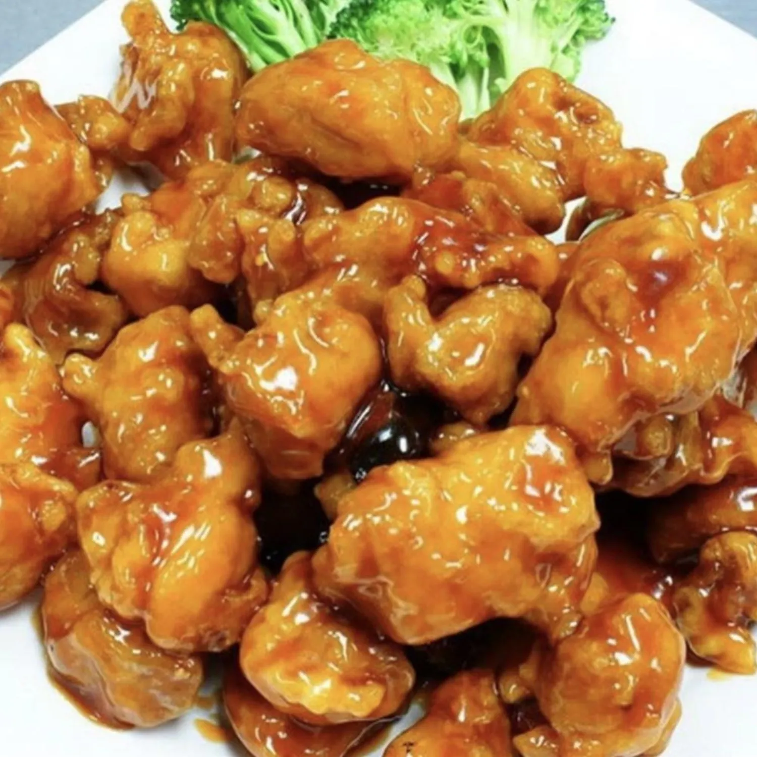 Crispy chicken in sweet and tangy orange sauce at Spicy Chinese Kitchen, a Chinese Restaurant in Torrance.