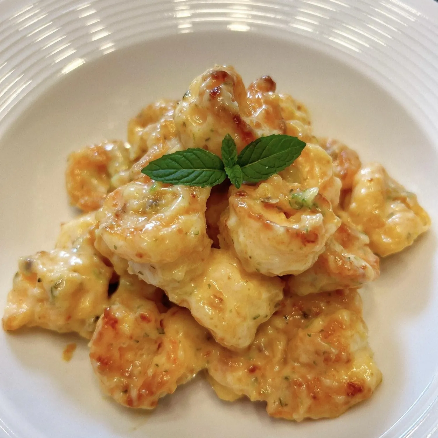 Creamy shrimp with savory sauce and mint garnish at Spicy Chinese Kitchen, a Chinese Restaurant in Torrance.