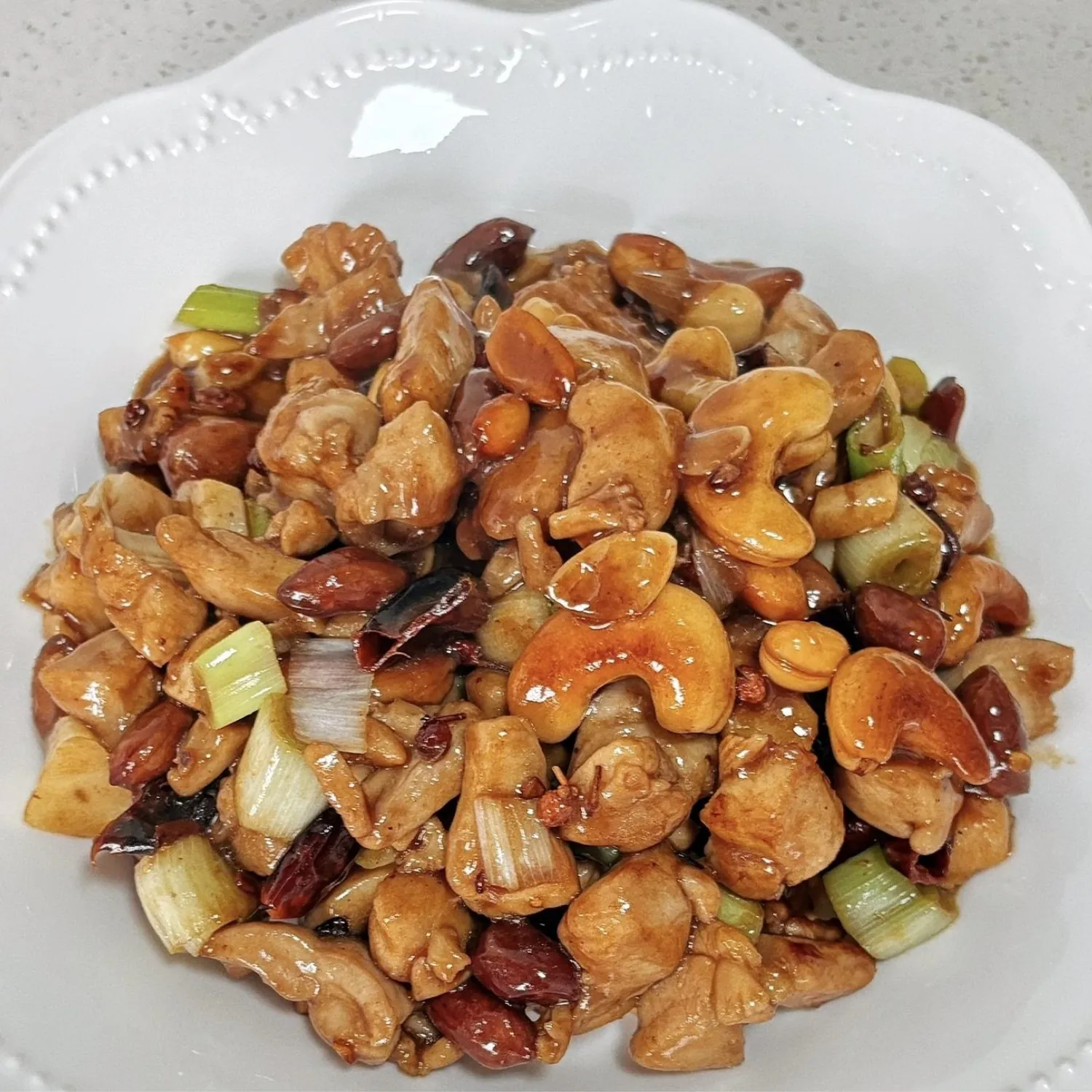 Savory chicken stir-fry with cashews and chili at Spicy Chinese Kitchen, a Chinese Restaurant in Torrance.